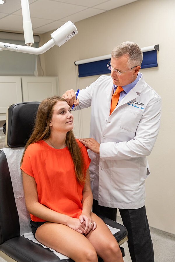 Gulf Coast Plastic Surgery Doctor with Patient