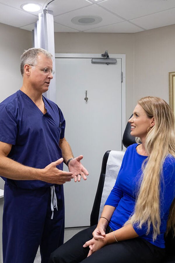 Gulf Coast Plastic Surgery doctor consultation with female patient
